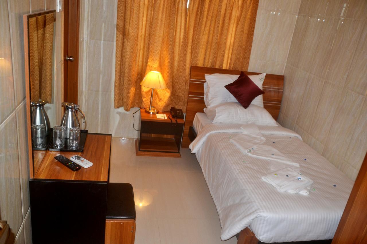 Peace Inn Chennai Rom bilde